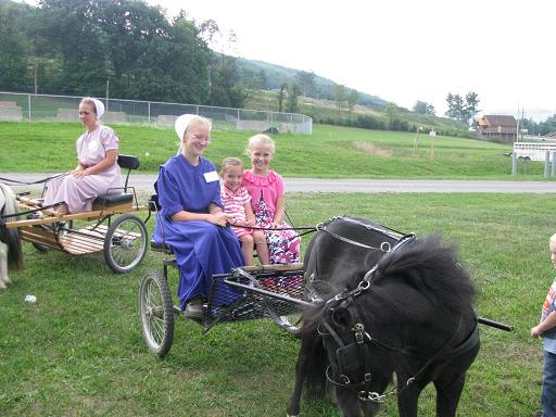 Pony-cart rides --Chrissy Petersheim and Brooklyn Fox